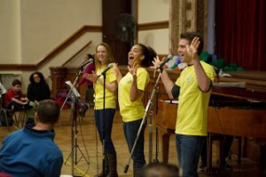 Billy Tighe, Gabby McClinton and Bethany Moore performing choreography during the concert time at the December 7 Music for Autism performance